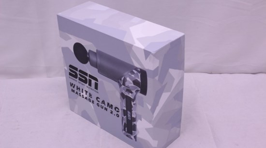 Karton med bild comflage-färgad massagepistol