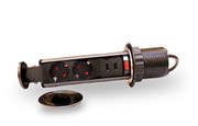 Liggande bild på svart grenuttag med två uttag för stickkontakt och två USB-uttag